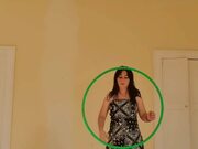 Woman Performs Tricks With Hoop