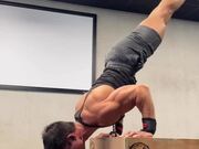 Guy Does Handstand Push-Ups