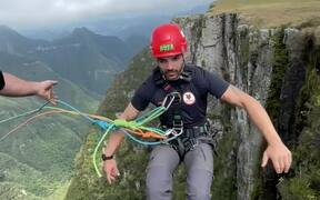 Venturesome Man Swings in the Air Like a Pendulum - Fun - VIDEOTIME.COM