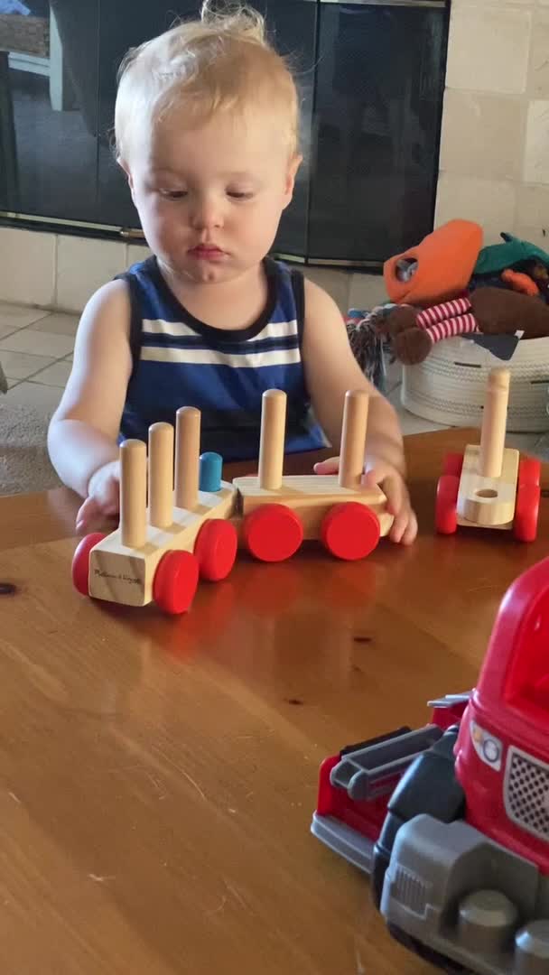 Kiddo Figures Out And Puts Together His Toy Train