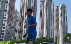 Guy Performs Spinning Taekwondo Kick on Street - Sports - VIDEOTIME.COM