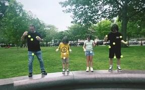 Family Beautifully Juggles Balls Together - Fun - Videotime.com