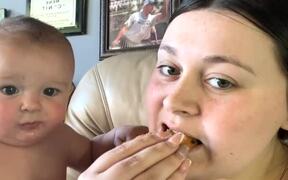 Toddler Takes Bite From Aunt's Cookie