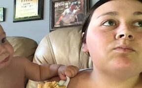 Toddler Takes Bite From Aunt's Cookie