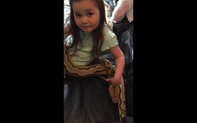 Little Girl Interacting With Her Pet Pythons - Animals - VIDEOTIME.COM