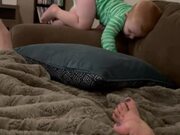 Silly Baby Crazily Dives Onto Pup's Bed 