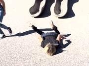 Woman Tumbles and Faceplants On Ground