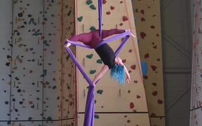 Aerial Artist Attempts Full Split and Other Tricks