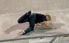 Skateboarder Falls Into Bank