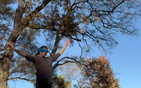 Blindfolded Individual Walks on Slacklining Rope - Fun - VIDEOTIME.COM