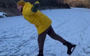 Guy Acting Cocky While Skating On Frozen River