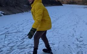 Guy Acting Cocky While Skating On Frozen River - Sports - VIDEOTIME.COM