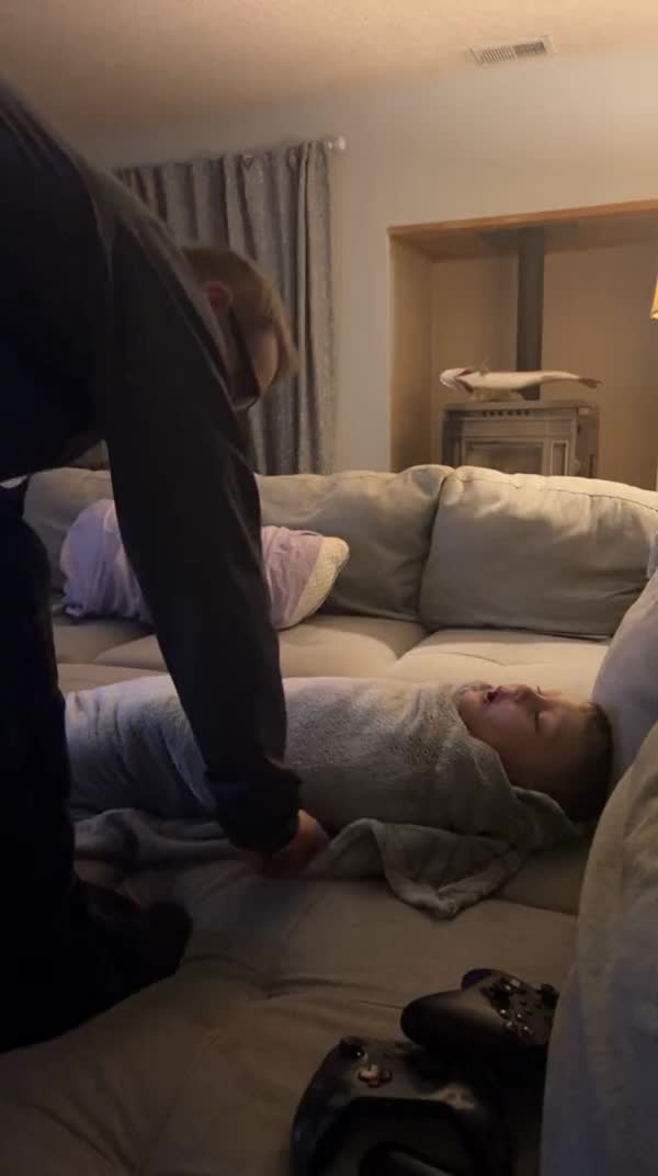 Father Does Blanket Roll Trick With His Son