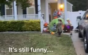 Kid Wearing Inflatable Dinosaur Costume - Kids - VIDEOTIME.COM