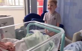 Twin Brothers Take Care of Their Newborn Brother