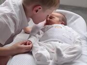 Twin Brothers Take Care of Their Newborn Brother