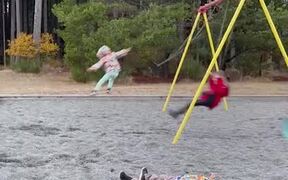 Kids Jump Off Swing Set Playfully - Kids - VIDEOTIME.COM