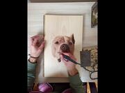 Artist Creates Portrait of Dog on Basswood Slab