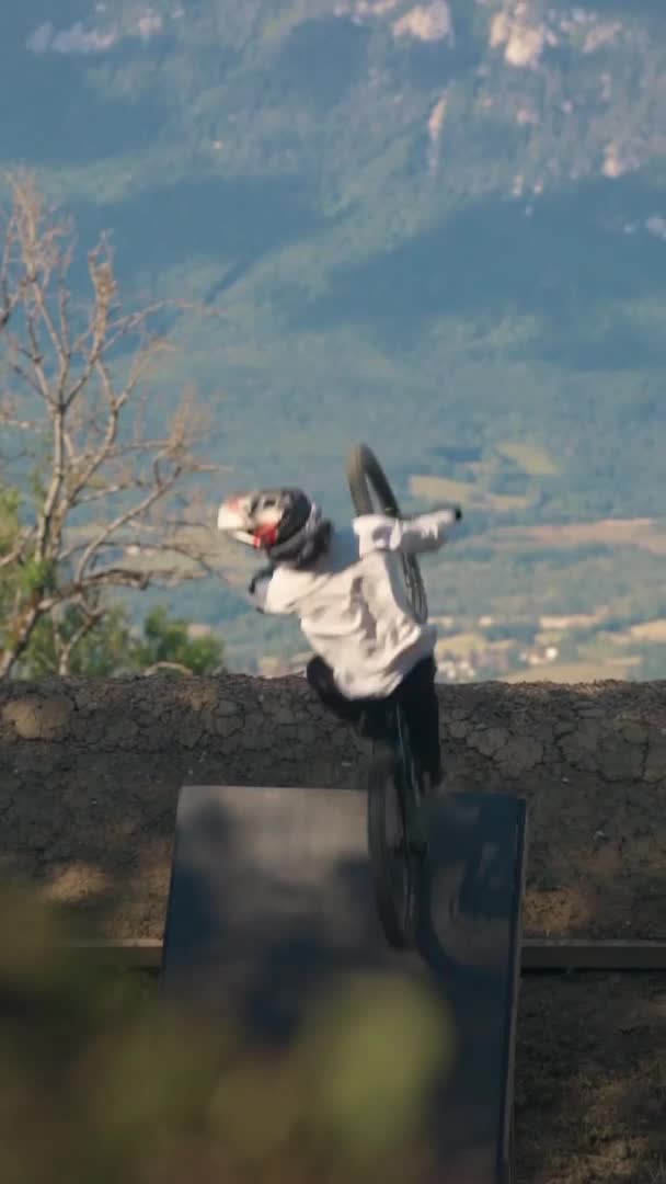 Mountain Bike Free Rider Jumps High Off Slope