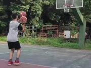 Person Nets Two Basketball in Hoop at Once