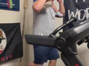 Dad Carrying Daughter on Treadmill