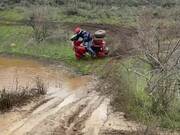 ATV Rider Dumped Into a Puddle