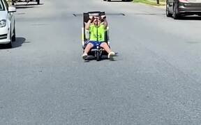 Kid Loads Trashed Gaming Chair On His Scooter - Kids - VIDEOTIME.COM