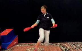 Circus Artist Juggles Pins With Her Feet - Fun - VIDEOTIME.COM