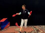 Circus Artist Juggles Pins With Her Feet