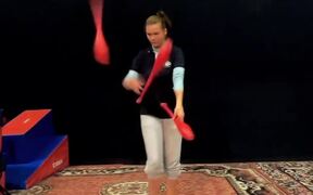 Circus Artist Juggles Pins With Her Feet