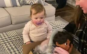 Toddler Gets Excited About Receiving Doll as Gift