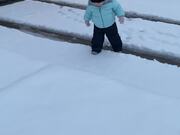 Baby Eealizes That Playing In The Snow Isn't Easy