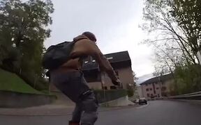 Person Rides on Roller Skates Through City