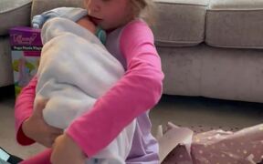 Little Girl is Overjoyed to Receive Reborn Doll
