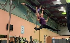 Couple Falls Together While Practicing AerialTrick