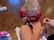 Adorable Girl Applies Nail Polish to Her Father