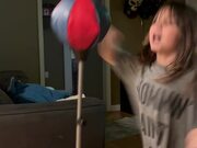 Punching Bag Hits Kid in Her Face