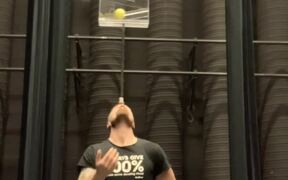 Man Balances Ball-Rolling Box on Forehead - Fun - VIDEOTIME.COM