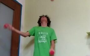 Guy Juggles Numerous Balls at Once For Minutes