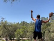 Guy Balances Himself on Slackline and Plays Catch