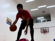 Guy Wearing Blindfold Attempts Basketball Tricks