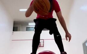 Guy Wearing Blindfold Attempts Basketball Tricks