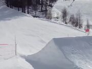 Skier Tumbles After Jumping Off Snow Ramp