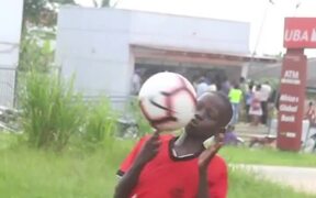 Kid Spins Soccer Ball Over His Finger - Kids - VIDEOTIME.COM