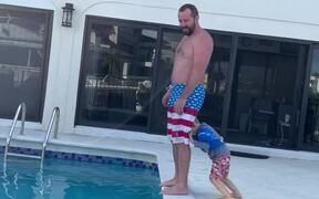Kid Trying to Push Father Into Pool
