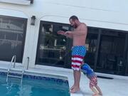 Kid Trying to Push Father Into Pool