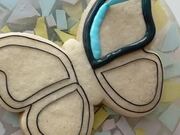 Person Bakes and Decorates Cookies
