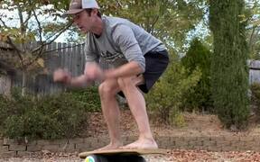Man Balances on Double Boards