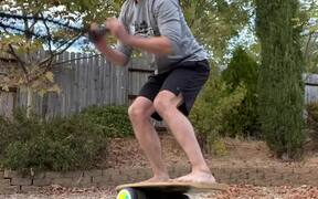 Man Balances on Double Boards - Fun - VIDEOTIME.COM