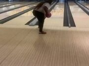 Woman Loses Footing and Falls While Bowling